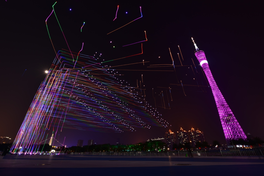 Long exposure shot of the 1000 EHang UAVs taking off Long exposure shot of the 1000 EHang UAVs taking off
