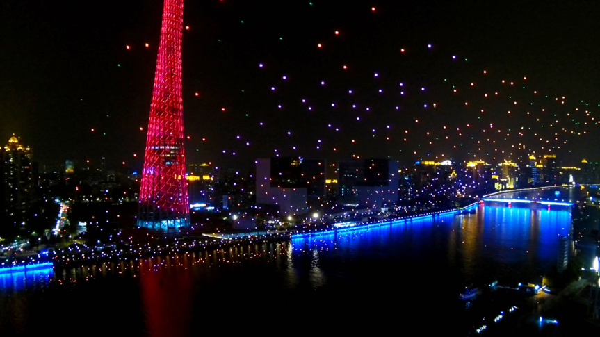 The “Meteor Sky” 1000 UAV formation reflecting the night view of the Canton Tower and the Pearl River The “Meteor Sky” 1000 UAV formation reflecting the night view of the Canton Tower and the Pearl River